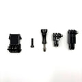 Set of black camera accessories on a white background
